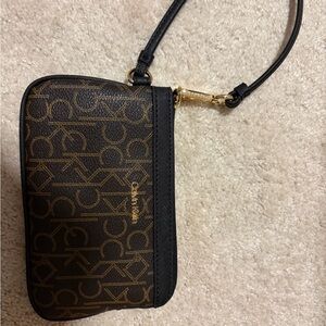 Calvin Klein Black and Gold Logo Wristlet